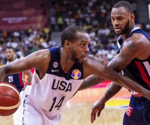 epa07834740 Khris Middleton (L) of the USA in action against Rudy Gobert (R) of France during the FIBA Basketball World Cup 2019 quarter final match between the USA and France in Dongguan, China, 11 September 2019.  EPA/ALEX PLAVEVSKI
