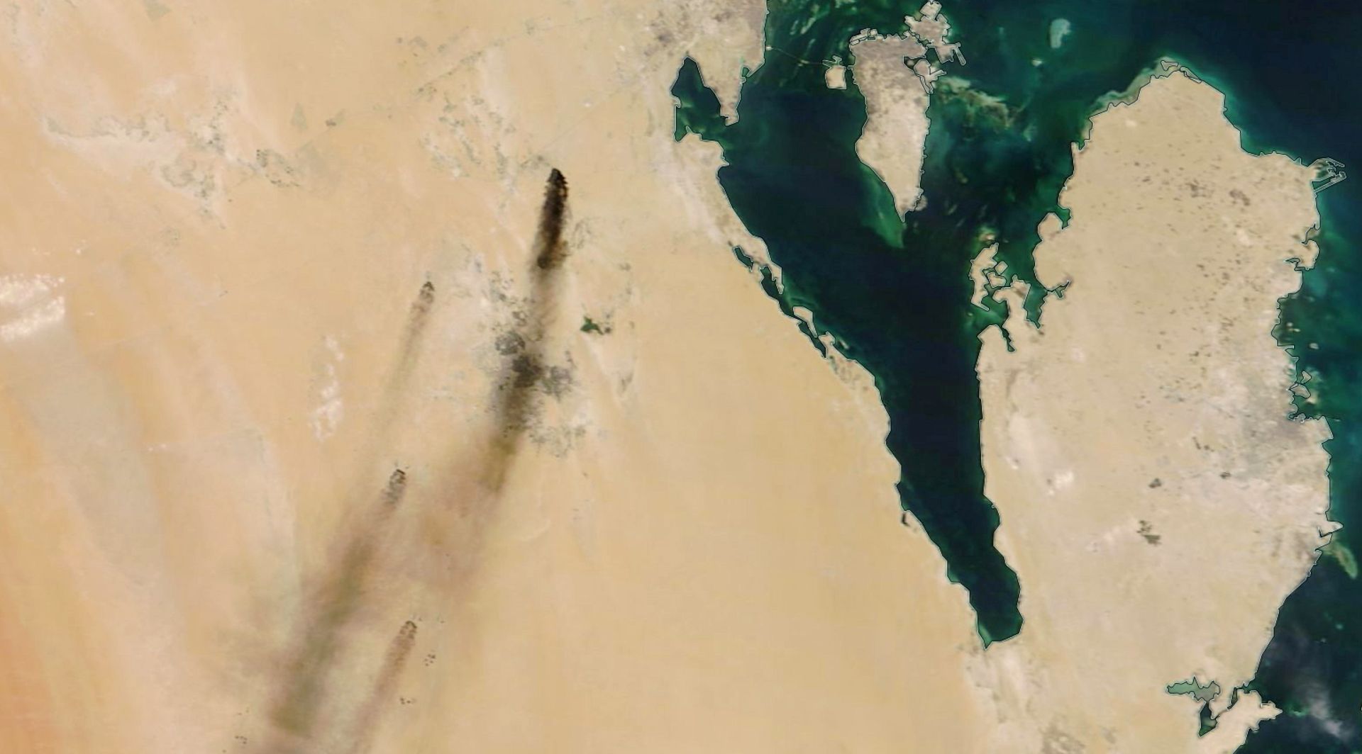 epa07844126 A handout photo made available by NASA Worldview shows a satellite image of smoke from fires at two major oil installations in eastern Saudi Arabia, 14 September 2019 (issued 15 September 2019), following alleged drone attacks claimed by Yemen's Houthi rebels. According to Saudi state-owned oil company Aramco, two of its oil facilities in Saudi Arabia, Khurais and Abqaiq, were set on fire on 14 September after allegedly having been targeted by drone attacks. In picture is seen Bahrain (island, top) and Qatar (peninsula, R).  EPA/NASA WORLDVIEW HANDOUT  HANDOUT EDITORIAL USE ONLY/NO SALES