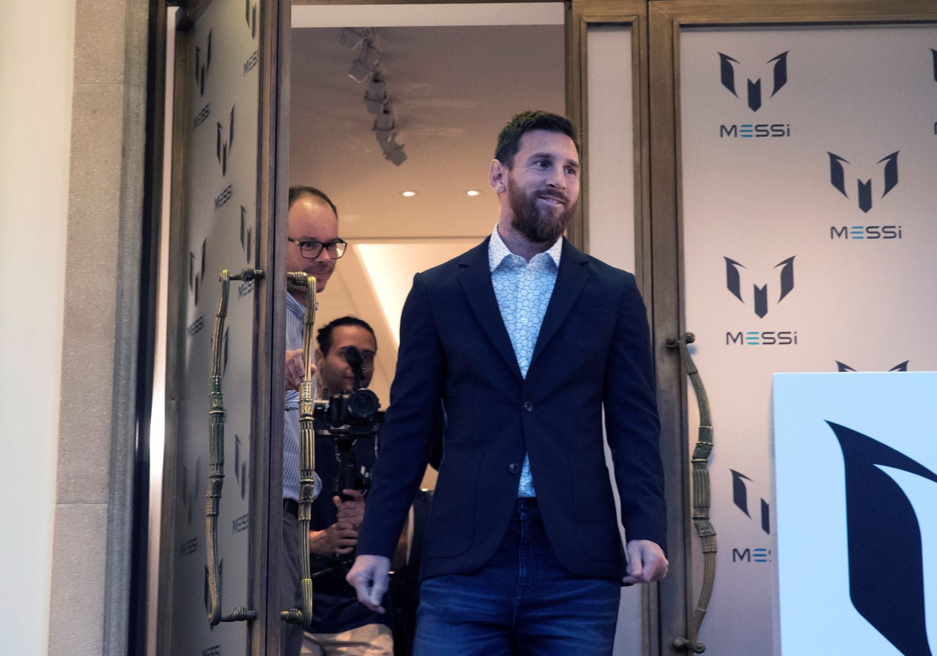 epa07854243 FC Barcelona's player Lionel Messi from Argentina presents his own clothes collection in Barcelona, Catalonia, Spain, 19 September 2019. The Leo Messi fashion collection has been designed by designer Virginia Hilfiger and his sister Maria Sol Messi.  EPA/Marta Perez