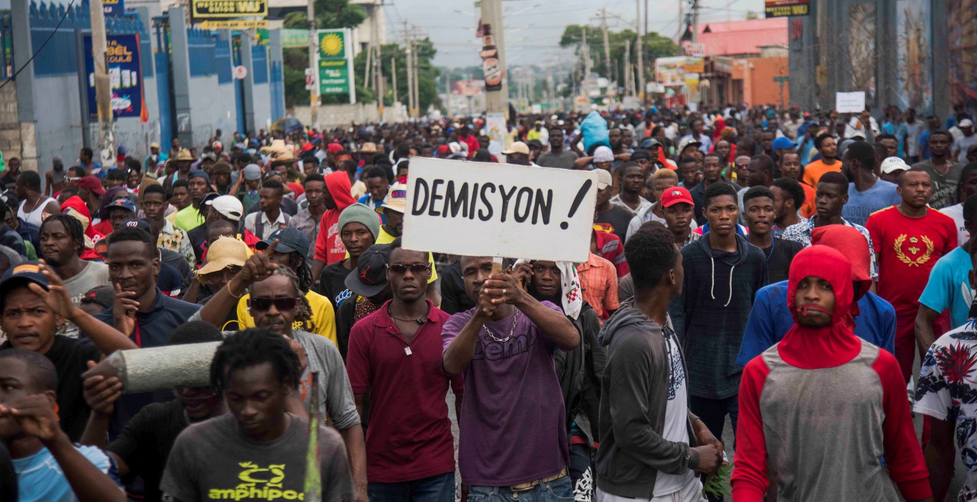 epa07857902 People participate during protests held to request the resignation of President of Haiti Jovenel Moise, in Port-au-Prince, Haiti, 20 September 2019. Haiti experienced a new day of protests over fuel shortages, which have persisted since  August. At least one person was killed during the day's protests.  EPA/JEAN MARC HERVE ABELARD