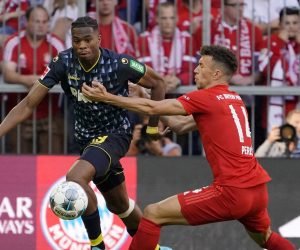 epa07859133 Bayern's Ivan Perisic (R) in action against Cologne's Kingsley Ehizibue (L) during the German Bundesliga soccer match between FC Bayern Munich and 1. FC Koeln, in Munich, Germany, 21 September 2019.  EPA/RONALD WITTEK CONDITIONS - ATTENTION: The DFL regulations prohibit any use of photographs as image sequences and/or quasi-video.