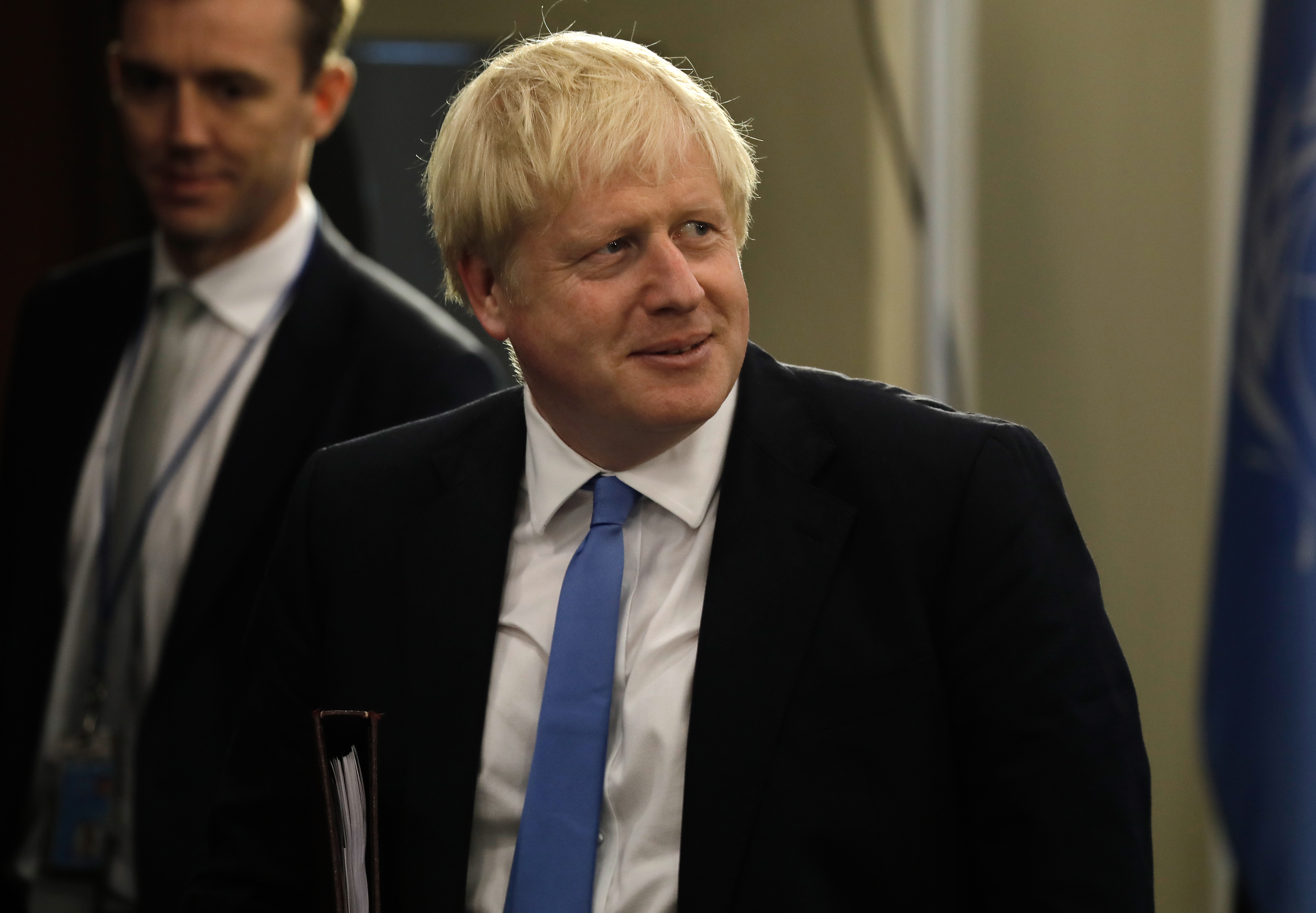 epa07864543 British Prime Minister Boris Johnson departs from the 2019 Climate Action Summit which is being held in advance of the General Debate of the General Assembly of the United Nations at United Nations Headquarters in New York, New York, USA, 23 September 2019. World Leaders have been invited to speak at the event, which was organized by the United Nations Secretary-General Antonio Guterres, for the purpose of proposing plans for addressing global climate change. The General Debate of the 74th session of the UN General Assembly begins on 24 September.  EPA/PETER FOLEY