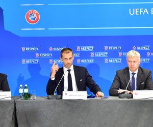 epa07867042 The President of the UEFA Aleksander Ceferin (C) gestures to the media at a press conference accompanied by Giorgio Marchetti (L) and Phil Townsend (R) during the UEFA  Executive Committee members meeting in Ljubljana, Slovenia, 23 September 2019. The UEFA has announced the venues for the Champions League finals 2021 (St. Petersburg), 2022 (Munich) and 2023 (London/Wembley).  EPA/ANTONIO BAT