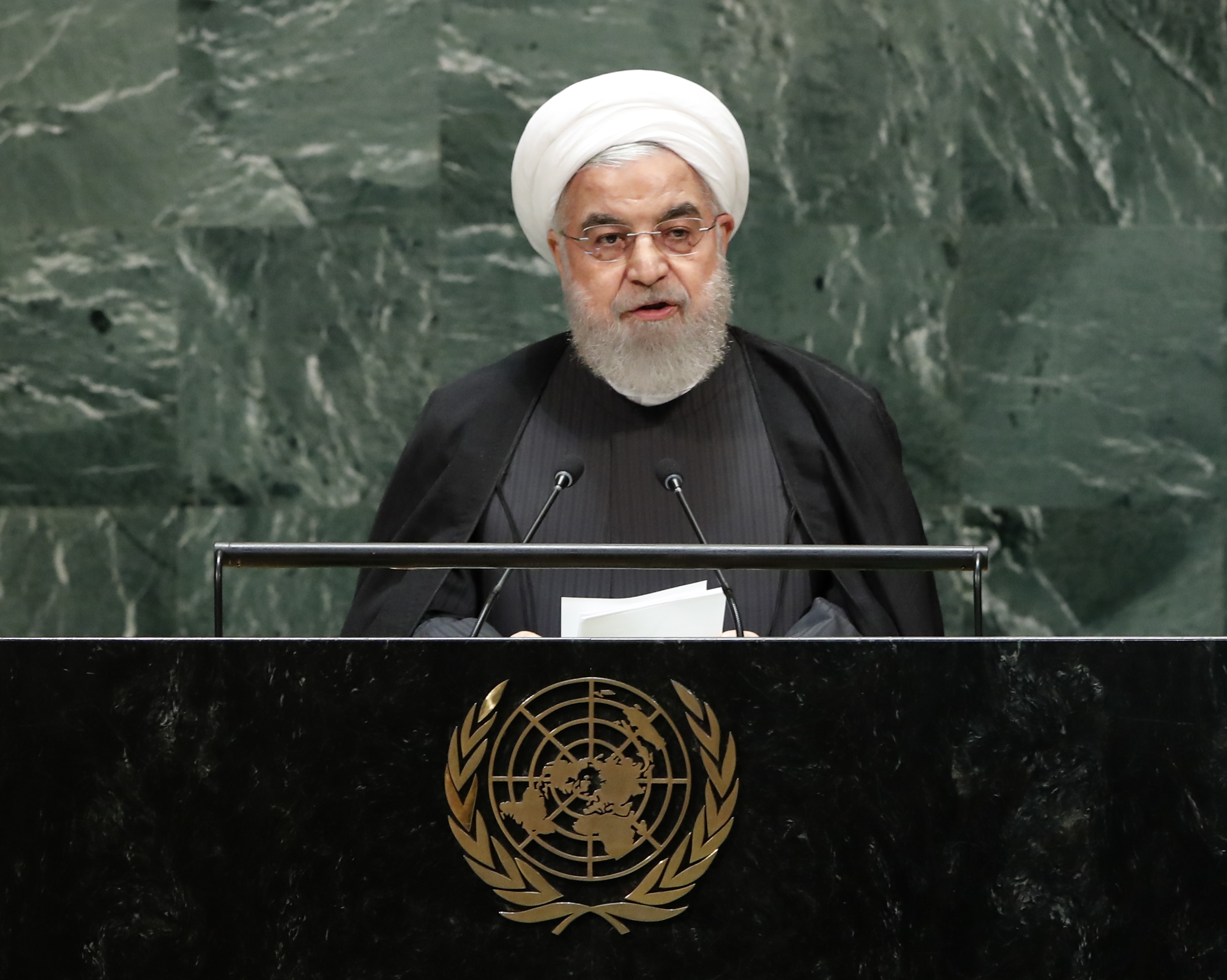 epa07868715 President of the Iran Hassan Rouhani speaks to the general debate of the 74th session of the General Assembly of the United Nations at United Nations Headquarters in New York, New York, USA, 25 September 2019. The annual meeting of world leaders at the United Nations runs until 30 September 2019.  EPA/JASON SZENES