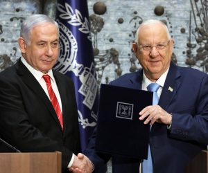 epa07869059 Israeli President Reuven Rivlin (R) hands a letter of appointment for entrusted with forming the next government to Israeli Prime Minister and Chairman of the Likud Party Benjamin Netanyahu (L) at the President's residence in Jerusalem, Israel, 25 September 2019. Media reports state, that negotiations between the Likud party headed by Benjamin Netanyahu that won 32 seats and the Blue and White party of Benny Gantz that won 33 seats for forming unity government did not succeed.  EPA/ABIR SULTAN