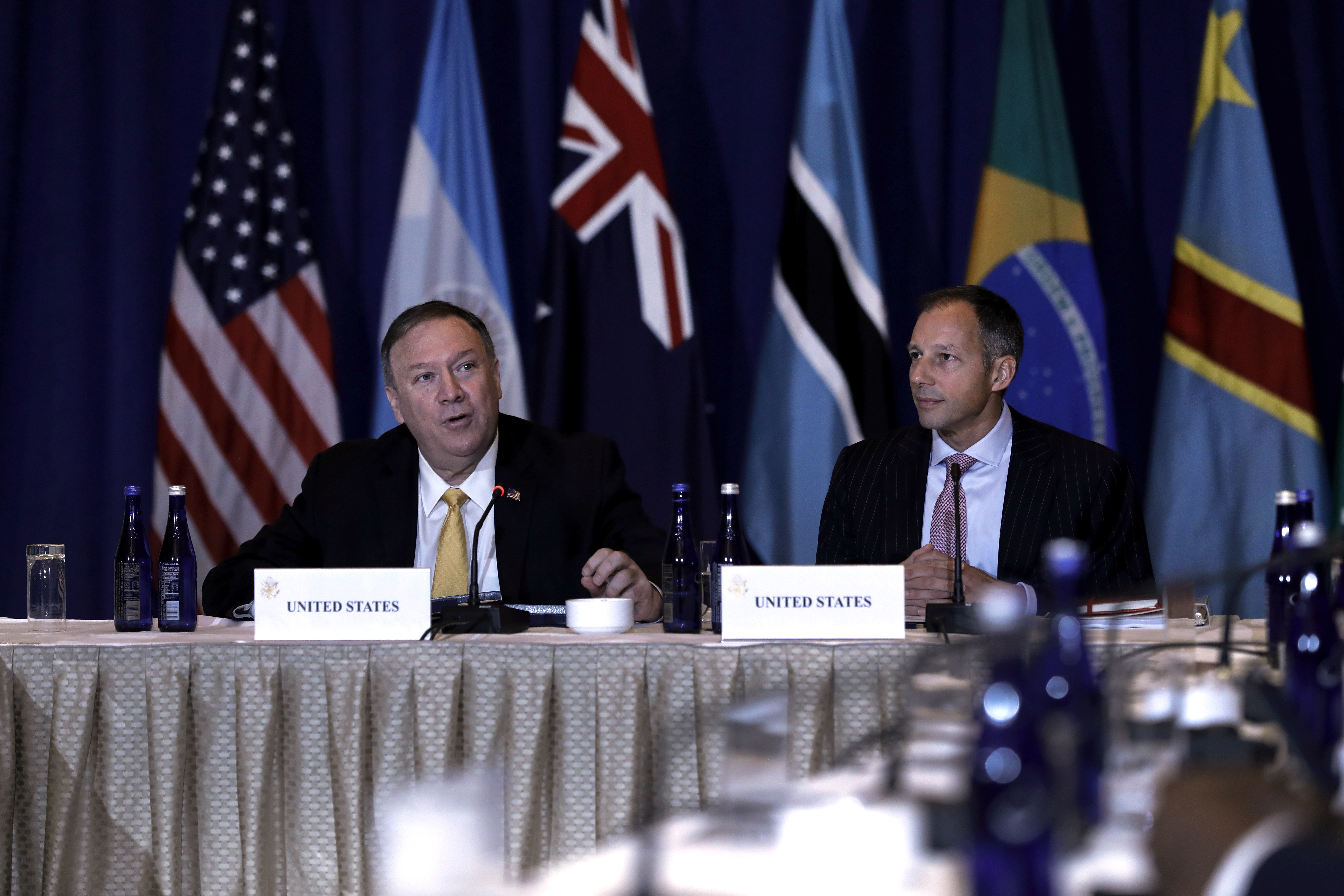 epa07871387 US Secretary of State Mike Pompeo (L) speaks the Energy Resource Governance Initiative conference at  the Lotte New York  Palace Hotel in New York, New York, USA, 26 September 2019. The conference is to promote sound governance and resilient energy mineral supply chains.  EPA/Peter Foley