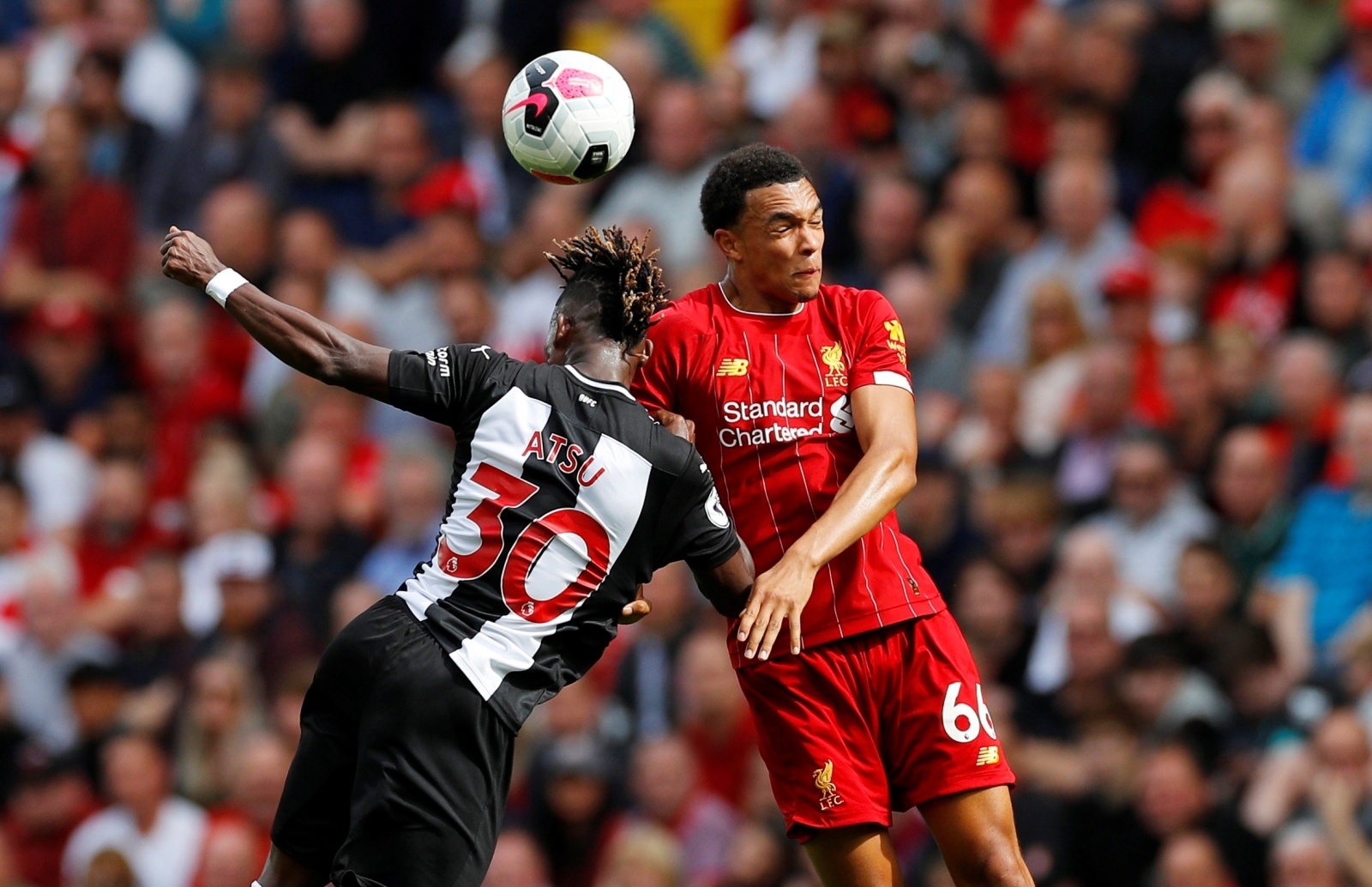 Premier League - Liverpool v Newcastle United Soccer Football - Premier League - Liverpool v Newcastle United - Anfield, Liverpool, Britain - September 14, 2019  Newcastle United's Christian Atsu in action with Liverpool's Trent Alexander-Arnold   REUTERS/Phil Noble  EDITORIAL USE ONLY. No use with unauthorized audio, video, data, fixture lists, club/league logos or "live" services. Online in-match use limited to 75 images, no video emulation. No use in betting, games or single club/league/player publications.  Please contact your account representative for further details. PHIL NOBLE