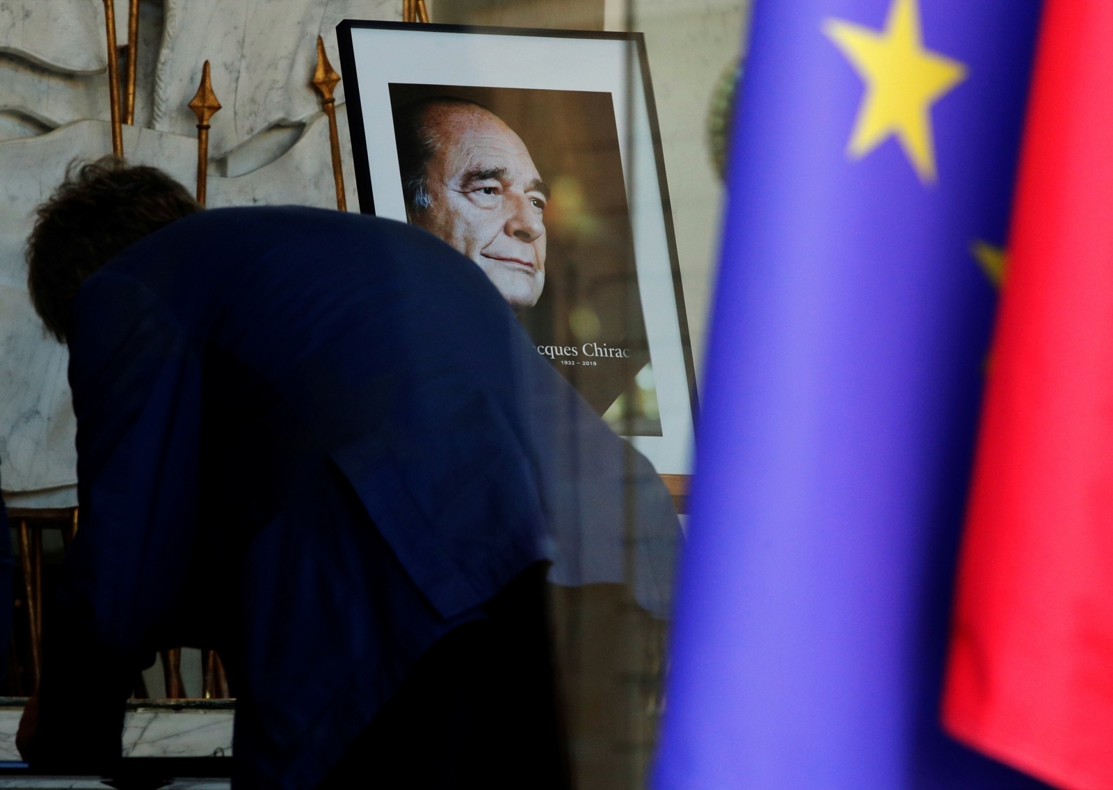 A person signs the book of condolences to pay tribute to late former French President Jacques Chirac at the Elysee Palace in Paris A person signs the book of condolences to pay tribute to late former French President Jacques Chirac at the Elysee Palace in Paris, France, September 27, 2019. REUTERS/Philippe Wojazer PHILIPPE WOJAZER