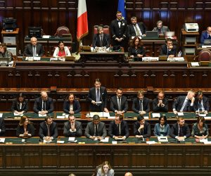 epa07829576 Italian Premier Giuseppe Conte (C) stands during his address to the Lower House ahead of a confidence vote, in Rome, Italy, 09 September 2019. Conte presented on the day his new government's programme in the Lower House ahead of the first of two confidence votes that the executive is set to face in parliament. His new government is a coalition between the anti-establishment 5-Star Movement (M5S) and the center-left Democratic Party (PD).  EPA/ALESSANDRO DI MEO