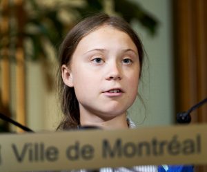 epa07875342 Swedish climate activist Greta Thunberg speaks at the Montreal city hall after she received the key to the city from the Mayor of Montreal Valerie Plante (not pictured) following the climate strike in Montreal, Quebec, Canada, 27 September 2019. Thunberg participated in several climate events in Montreal, continuing a month-long series of climate-related appearances in the US and Canada which began with her sailing from England to New York in late August.  EPA/VALERIE BLUM