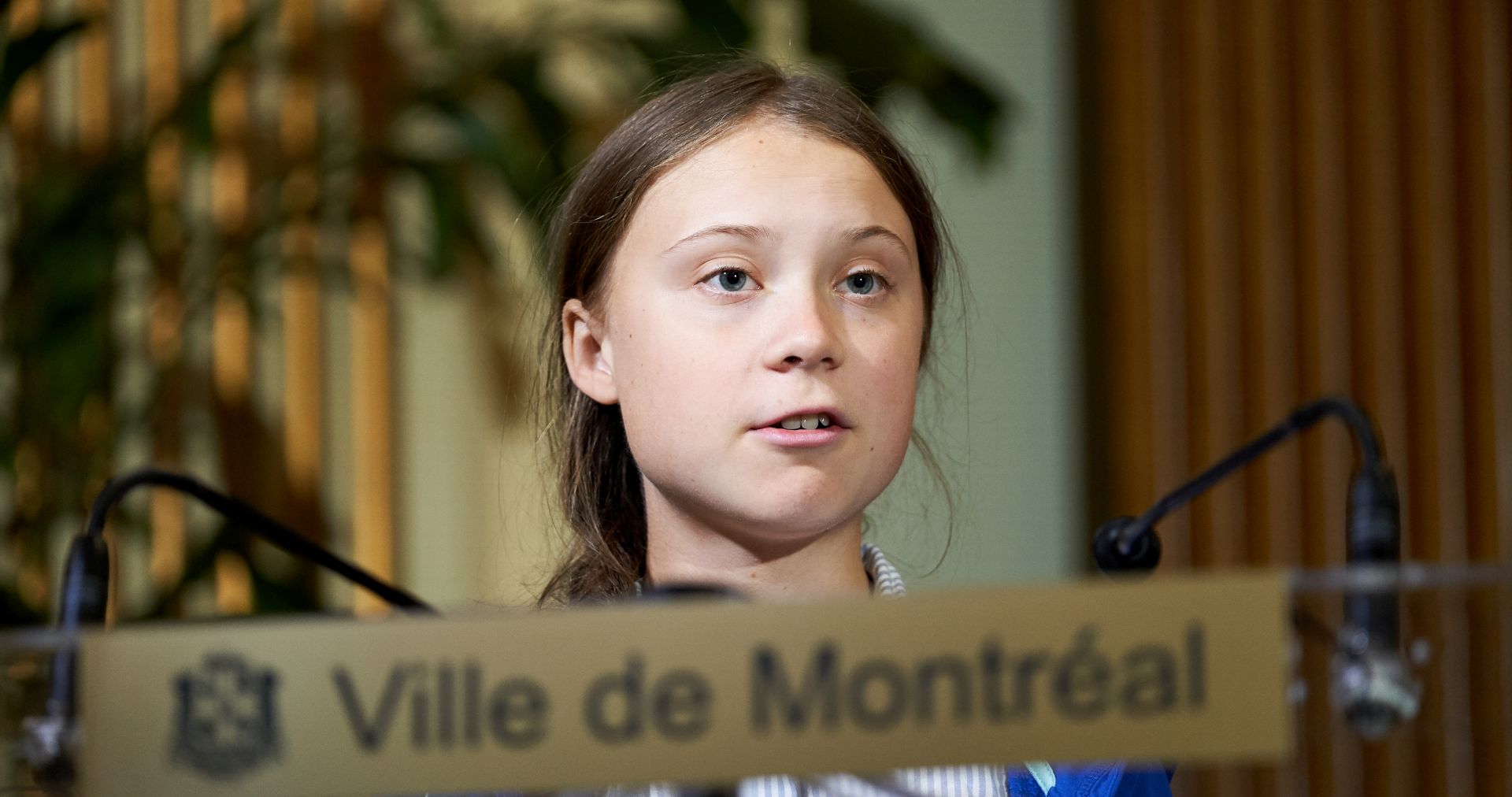epa07875342 Swedish climate activist Greta Thunberg speaks at the Montreal city hall after she received the key to the city from the Mayor of Montreal Valerie Plante (not pictured) following the climate strike in Montreal, Quebec, Canada, 27 September 2019. Thunberg participated in several climate events in Montreal, continuing a month-long series of climate-related appearances in the US and Canada which began with her sailing from England to New York in late August.  EPA/VALERIE BLUM