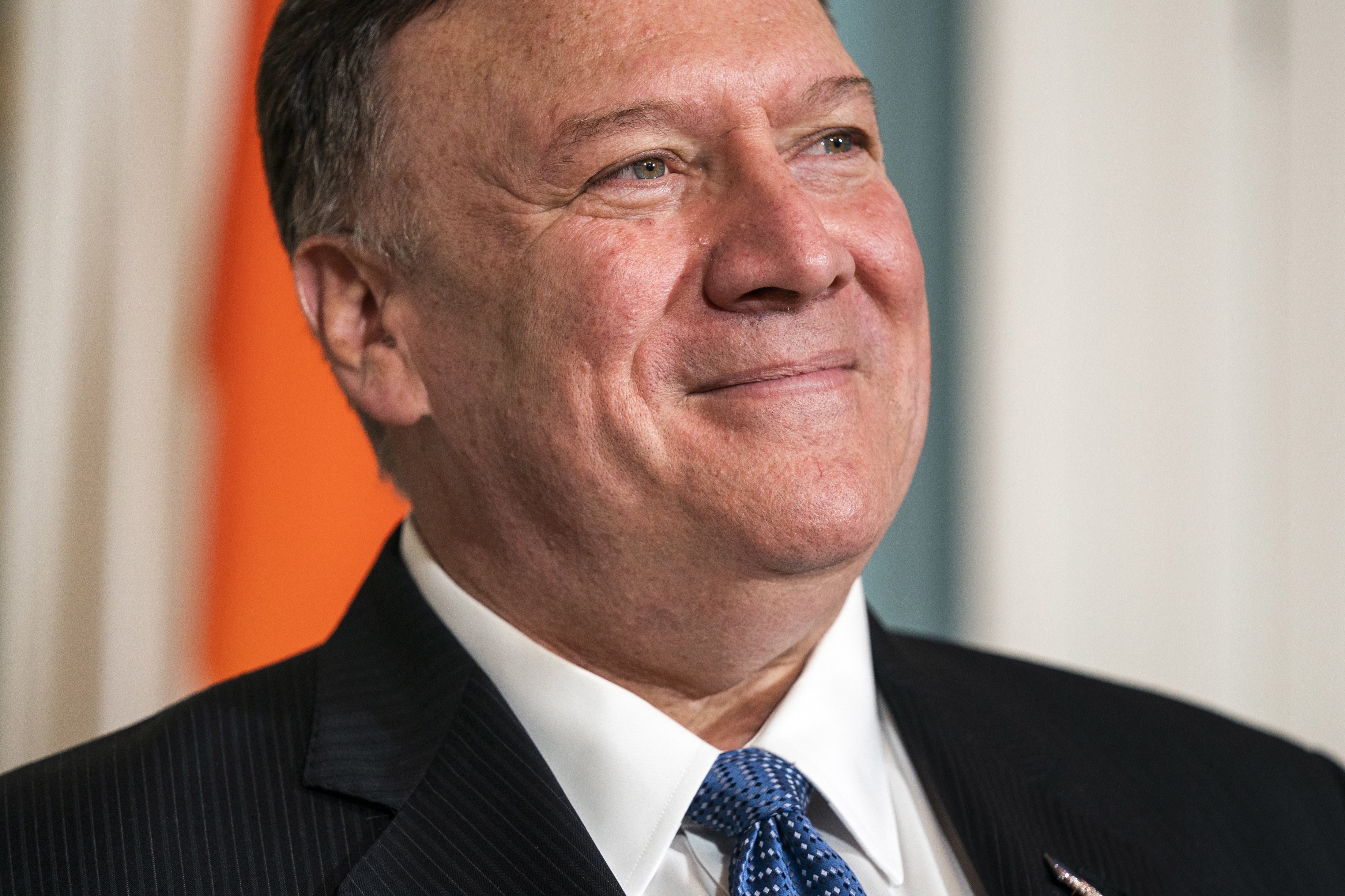 epa07883364 US Secretary of State Mike Pompeo smiles during a photo-op with Indian External Affairs Minister (not pictured) in the State Department in Washington, DC, USA, 30 September 2019. Pompeo is facing increasing scrutiny from House lawmakers investigating the Trump whistleblower complaint. He ignored shouted questions about the issue.  EPA/JIM LO SCALZO