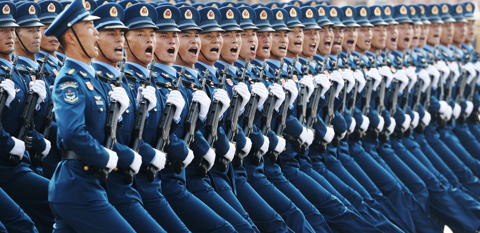 epa07884190 Military troops march past Tiananmen Square during a military parade marking the 70th anniversary of the founding of the People's Republic of China, in Beijing, China, 01 October 2019. China commemorates the 70th anniversary of the founding of the People's Republic of China on 01 October 2019 with a grand military parade and mass pageant.  EPA/WU HONG