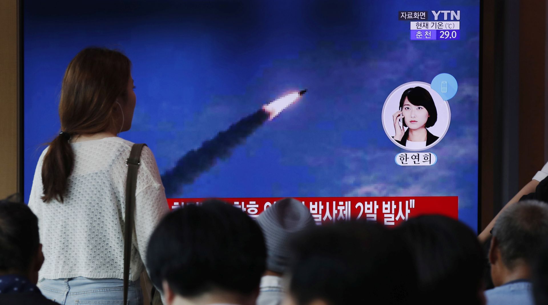 epa07887847 (FILE) - South Korean people watch breaking news reports of North Korea's missile launch at Seoul Station in Seoul, South Korea, 10 August 2019 (reissued 02 October 2019). According to media reports, North Korea tested a projectile suspected to be a submarine-launched ballistic missile on 02 October. The projectile apparently reached an altitude of 910km before landing in the Sea of Japan.  EPA/JEON HEON-KYUN