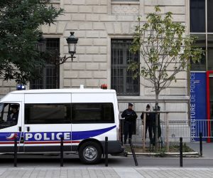 epa07891533 French police and security forces establish a security perimeter near the police headquarters in Paris, France, 03 October 2019. According to reports, a man was killed after attacking officers with a knife. Two officers were injured in the incident.  EPA/IAN LANGSDON