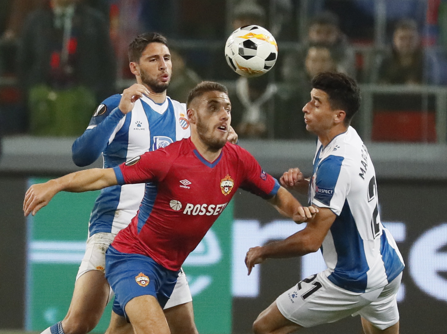 epa07893067 Marc Roca (R) of RCD Espanyol in action against Nikola Vlasic (C)  of CSKA during UEFA Europa League group stage match in Moscow, Russia, 03 October 2019.  EPA/MAXIM SHIPENKOV
