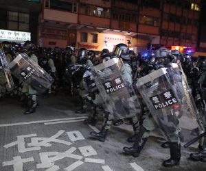epa07895401 Riot police move to disperse protesters at a rally against an anti-mask law meant to deter anti-government protesters in Causeway Bay,  Hong Kong, China, 04 October 2019. Hong Kong Chief Executive Carrie Lam said that her government would use emergency powers to ban face masks in public in a bid to end the city's protests. Hong Kong has been gripped by mass demonstrations since June over a now-withdrawn extradition bill, which have since morphed into a wider anti-government movement.  EPA/FAZRY ISMAIL