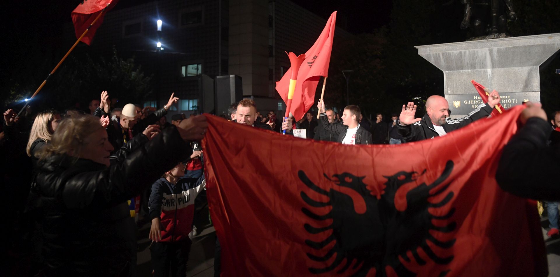 epa07902482 Supporters of Albin Kurti, founder of the opposition party 'Selfdetermination' (Vetevendosje) celebrate after the early exit polls of the parliamentary elections in Pristina, Kosovo, 06 October 2019. About 1.9 million voters are eligible to vote for the 120 seats in Kosovo's parliament, 20 of which are reserved for ethnic Serbs and other minorities. Elections have been called in August 2019 after Prime Minister Ramush Haradinaj resigned as Kosovo's prime minister after a war crimes court in The Hague summoned him for questioning as a suspect.  EPA/GEORGI LICOVSKI