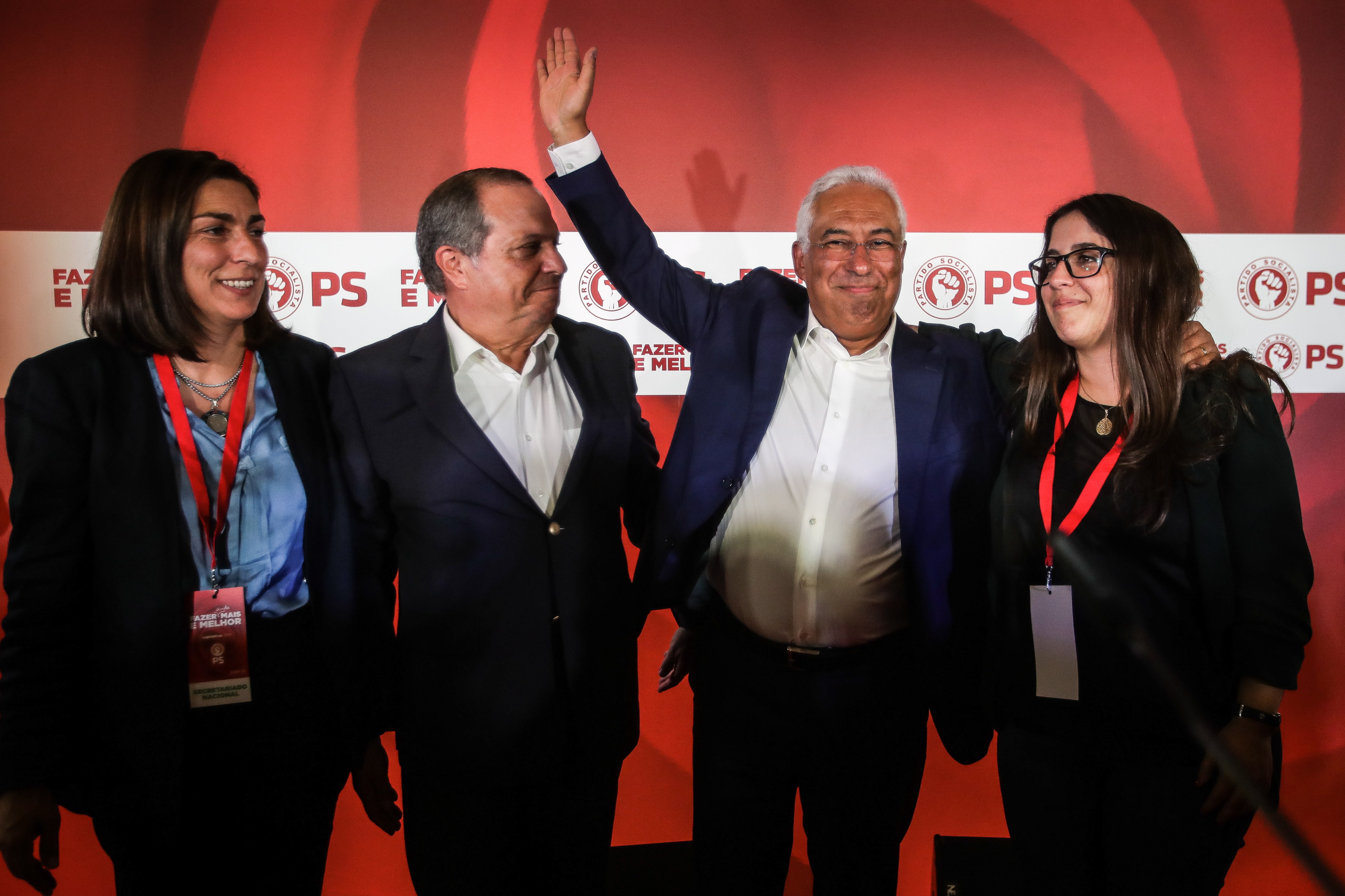 epa07902583 Portuguese Prime Minister and secretary general of the Socialist Party (PS), Antonio Costa (2-R), along with party members Ana Catarina Mendes (L) and Carlos Cesar (2L), celebrate after winning the legislative elections, in Lisbon, Portugal, 06 October 2019. More than 10.8 million registered voters were called to the polls to elect the 230 deputies for the next legislature and from where the XXII Constitutional Government will take place.  EPA/MARIO CRUZ
