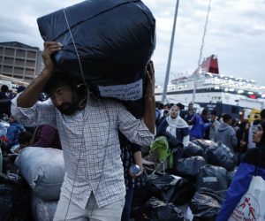 epa07902852 Migrants disembark from the ferry 'Nissos Samos' upon their arrival from Lesvos island to the port of Piraeus, Greece, 07 October 2019. The ferry arrived in Piraeus carrying 453 refugees and migrants from Moria, Lesvos and 13 from Chios Island, from the so-called vulnerable groups asking for asylum, who will be transferred to the village of Vagiohori, close to lake Volvi, in central Macedonia. The Moria reception and identification centre currently hosts 13,300 people, 1,000 of which are unaccompanied minors.  EPA/YANNIS KOLESIDIS