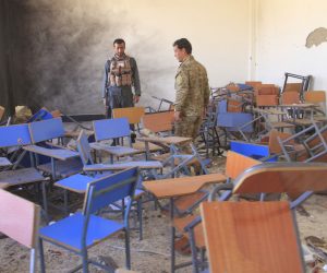 epa07904976 Afghan security officials inspect the Ghazni University after a bomb blast in Ghazni, Afghanistan, 08 October 2019. According to reports, at least 27 students including 22 girls and 5 boys were injured when a bomb exploded inside the Persian Literature Department of Ghazni University on 08 October.  EPA/SAYED MUSTAFA