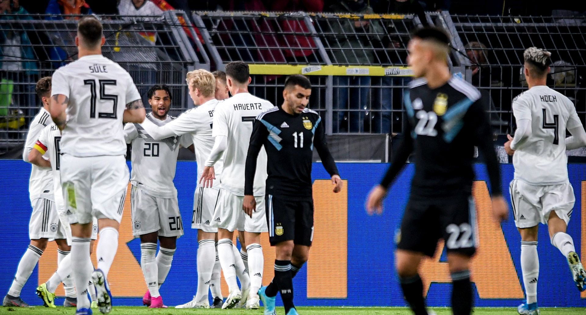 epa07908383 Germany's Serge Gnabry (3-L) celebrates with his teammates after scoring the 1-0 lead during the international friendly soccer match between Germany and Argentina in Dortmund, Germany, 09 October 2019.  EPA/SASCHA STEINBACH