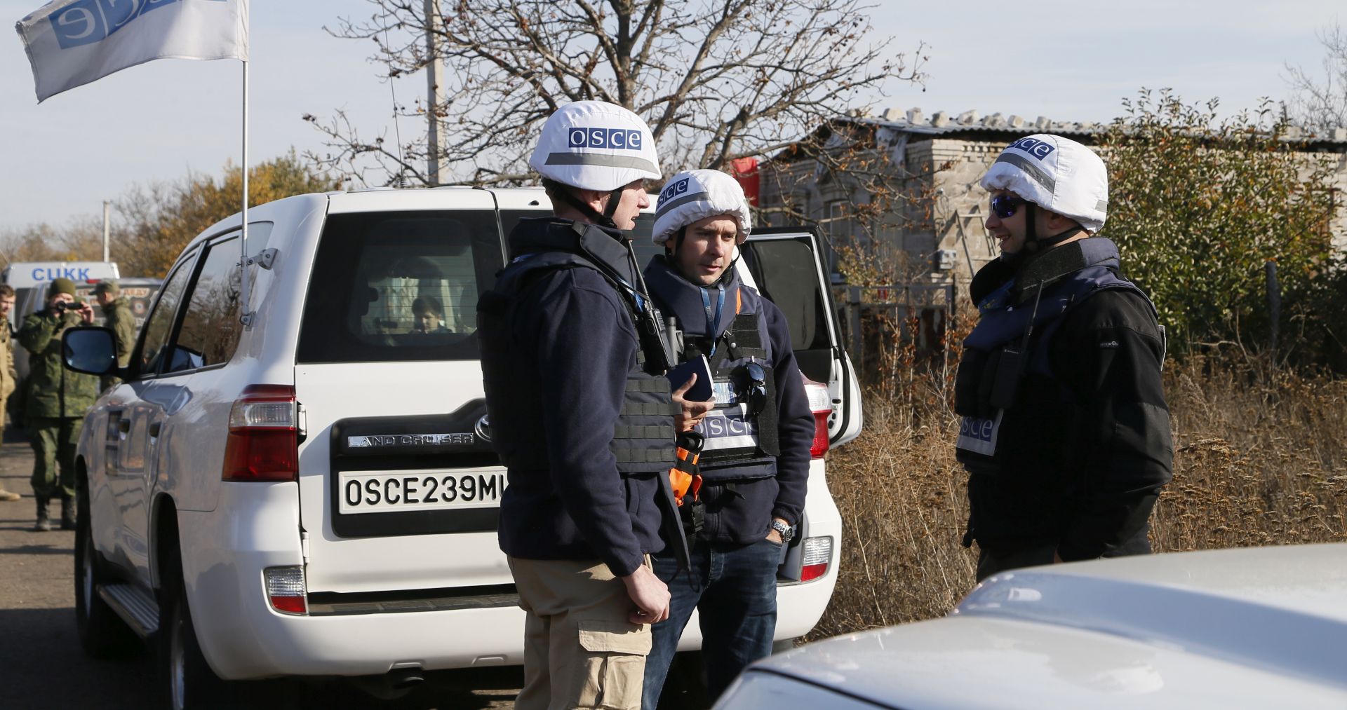 epa07908419 OSCE observers inspect the situation on the pro-Russian militants' side close to the front line near the Petrivske village, Donetsk area, Ukraine, 09 October 2019. Ukrainian Foreign Minister Vadym Prystaiko has said the disengagement of troops, which was planned on 07 October 2019 in the village of Petrivske and the town of Zolote, has been postponed due to shelling by Russian-led forces.  EPA/DAVE MUSTAINE