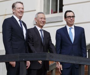 epa07910142 US Secretary of the Treasury Steven Mnuchin (R) and US Trade Representative Robert Lighthizer (L) greet Vice Premier of the People's Republic of China Liu He (C) prior to negotiations at the office of the US Trade Representative in Washington, DC, USA, 10 October 2019. The two nations' top trade negotiators are meeting for the first time since July and are attempting to negotiate an end to the US China trade war.  EPA/SHAWN THEW