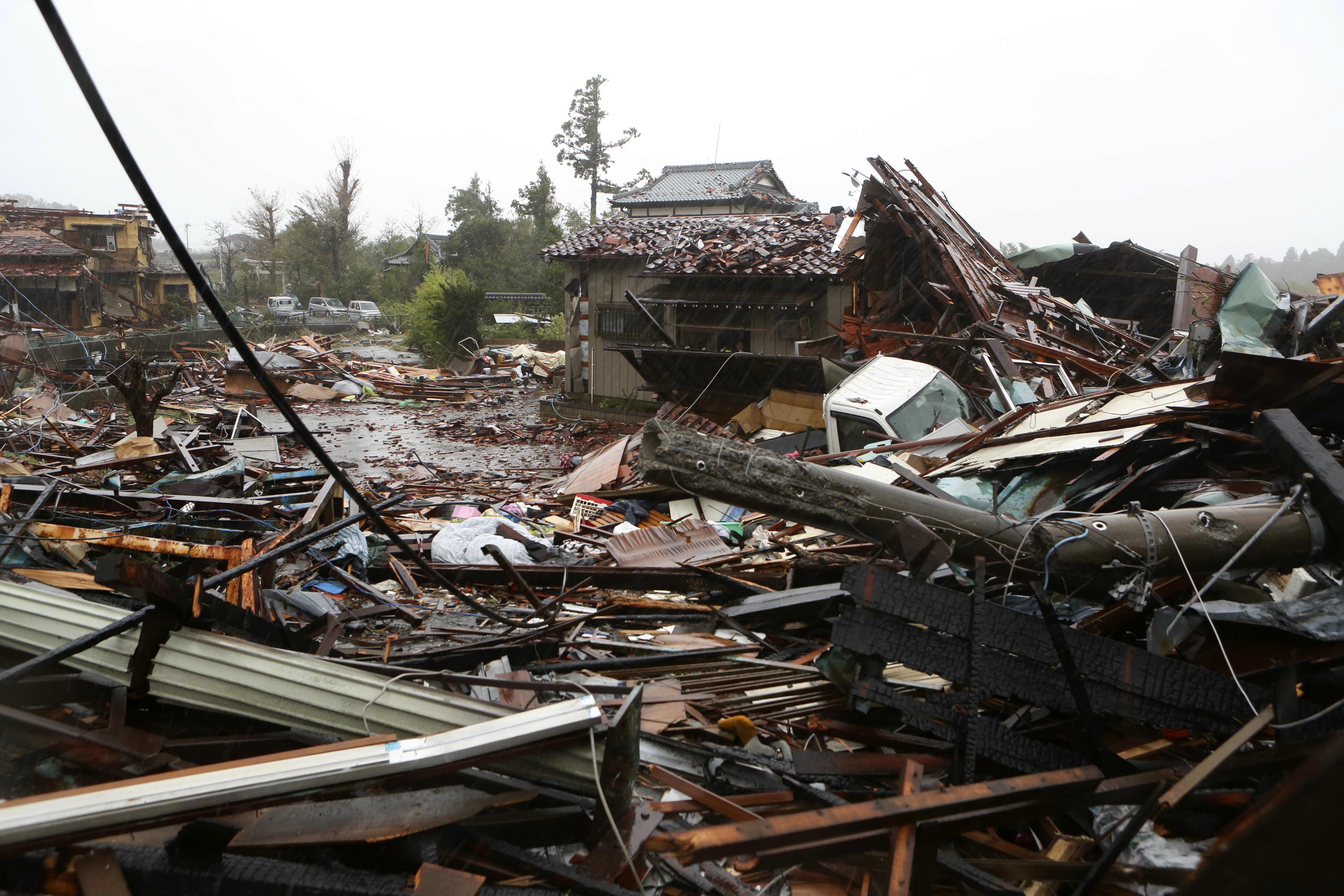 epa07914688 A view of damaged houses after a tornado caused by Typhoon Hagibis hit Ichihara, Chiba Prefecture, east of Tokyo, 12 October 2019. Tyhoon Hagibis is expected to make landfall on the Pacific coast of central Japan through eastern Japan in the evening of 12 October 2019. The strongest typhoon of this season has forced to suspend many Japan railway services all over the country and cancelled about 1,600 domestic and international flights. Japan's Meteorological Agency issued evacuation order to more than 1,400,000 people, news reported.  EPA/JIJI PRESS JAPAN OUT EDITORIAL USE ONLY/  NO ARCHIVES