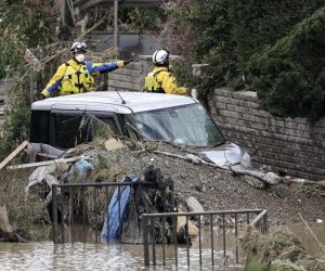 epa07919336 Police rescuers search for missing people in the Hoyasu area, which is flooded and devastated by Typhoon Hagibis, in Nagano, Nagano Prefecture, central Japan, 14 October 2019. Tyhoon Hagibis killed 40 people, injured more than 180 people and leave 16 others missing, Japan public television reported. The strongest typhoon this season forced the suspension of many Japan railway services all over the country and cancelled about 1,600 domestic and international flights. Japan's Meteorological Agency issued evacuation order to more than 4,000,000 people, according to news reports.  EPA/KIMIMASA MAYAMA