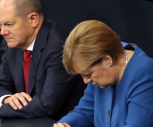 epa07926653 German Chancellor Angela Merkel (R) and Finance Minister Olaf Scholz attend a session of the German parliament 'Bundestag' in Berlin, Germany, 17 October 2019. Merkel delivered a government declaration on the upcoming EU summit.  EPA/FELIPE TRUEBA