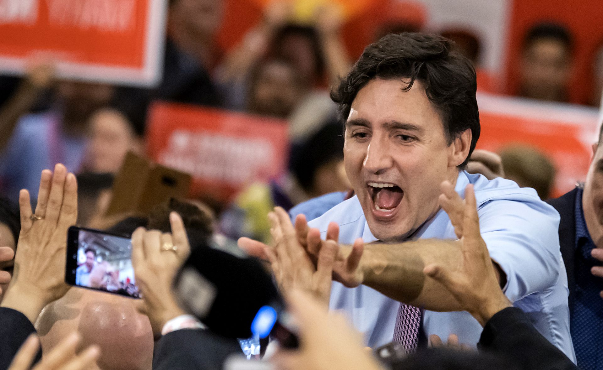 epa07931891 Canadian Prime Minister and Liberal Party leader Justin Trudeau greets supporters at a campaign rally in Vaughn, Ontario, Canada, 18 October 2019. Canadians will vote in the country's 43rd federal election on 21 October 2019.  EPA/WARREN TODA