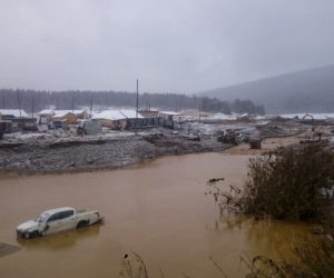 epa07932783 A handout photo made available by Russian Emergencies Ministry shows general view of destructions after a mining dam burst of gold mining technological reservoir, on the Seiba River near the village of Shchetinkino, Krasnoyarsk Region, Russia, 19 October 2019. Two mining workers dormitory was flooded as the dam collapsed, killing 12 people and leaving 13 workers still missing.  EPA/RUSSIAN EMERGENCIES MINISTRY / HANDOUT MANDATORY CREDIT HANDOUT EDITORIAL USE ONLY/NO SALES