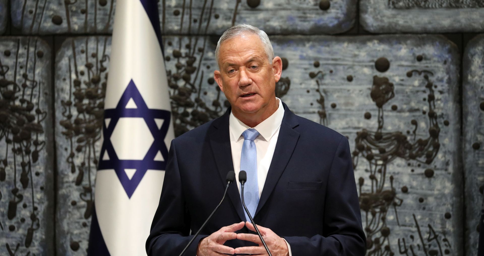 epa07943658 Benny Gantz, leader of the Blue and White party, speaks during a press statement after a letter of appointment for entrusted with forming the next government was handed to Gantz at the President's residence in Jerusalem, Israel, 23 October 2019. Israeli Prime Minister Netanyahu failed to form a coalition within the 28 days given to him by the President following the 17 September election. Benny Gantz will have his 28 days to form a coalition.  EPA/ABIR SULTAN