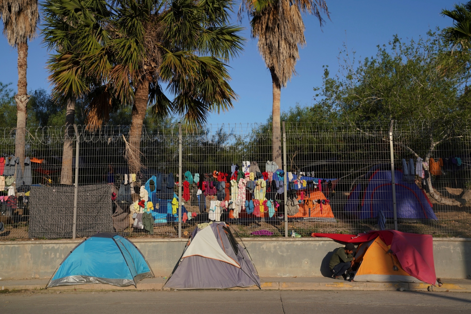 A migrant encampment is seen near the Gateway International Bridge in Matamoros A migrant encampment is seen near the Gateway International Bridge in Matamoros, Mexico October 7, 2019.  REUTERS/Veronica G. Cardenas VERONICA CARDENAS