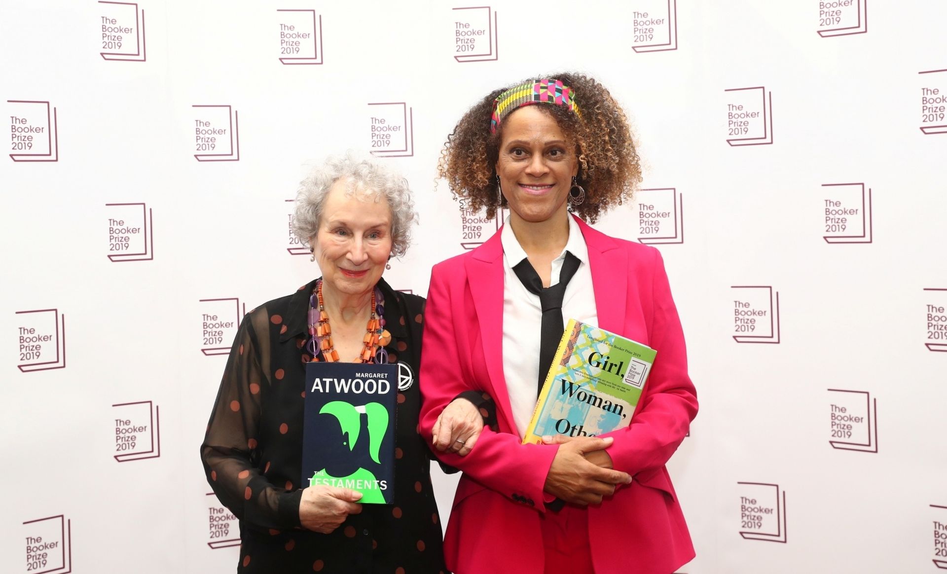 Margaret Atwood poses with Bernardine Evaristo after jointly winning the Booker Prize for Fiction 2019 at the Guildhall in London Margaret Atwood poses with Bernardine Evaristo after jointly winning the Booker Prize for Fiction 2019 at the Guildhall in London, Britain October 14, 2019. REUTERS/Simon Dawson SIMON DAWSON