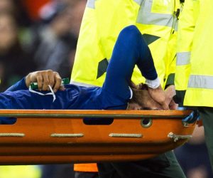 epa07970194 Everton's Andre Gomes (bottom) is stretchered off the pitch after being injured during the English Premier League soccer match between Everton FC and Tottenham Hotspur at the Goodison Park in Liverpool, Britain, 03 November 2019.  EPA/PETER POWELL EDITORIAL USE ONLY. No use with unauthorized audio, video, data, fixture lists, club/league logos or 'live' services. Online in-match use limited to 120 images, no video emulation. No use in betting, games or single club/league/player publications