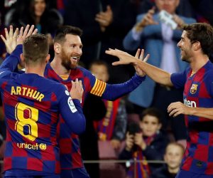 epa07984842 FC Barcelona's Argentinian striker Lionel Messi (C) celebrates with his teammates after scoring the 2-1 lead against Celta during their Spanish LaLiga Primera Division soccer match played at Camp Nou stadium in Barcelona, Spain, 09 November 2019.  EPA/Toni Albir