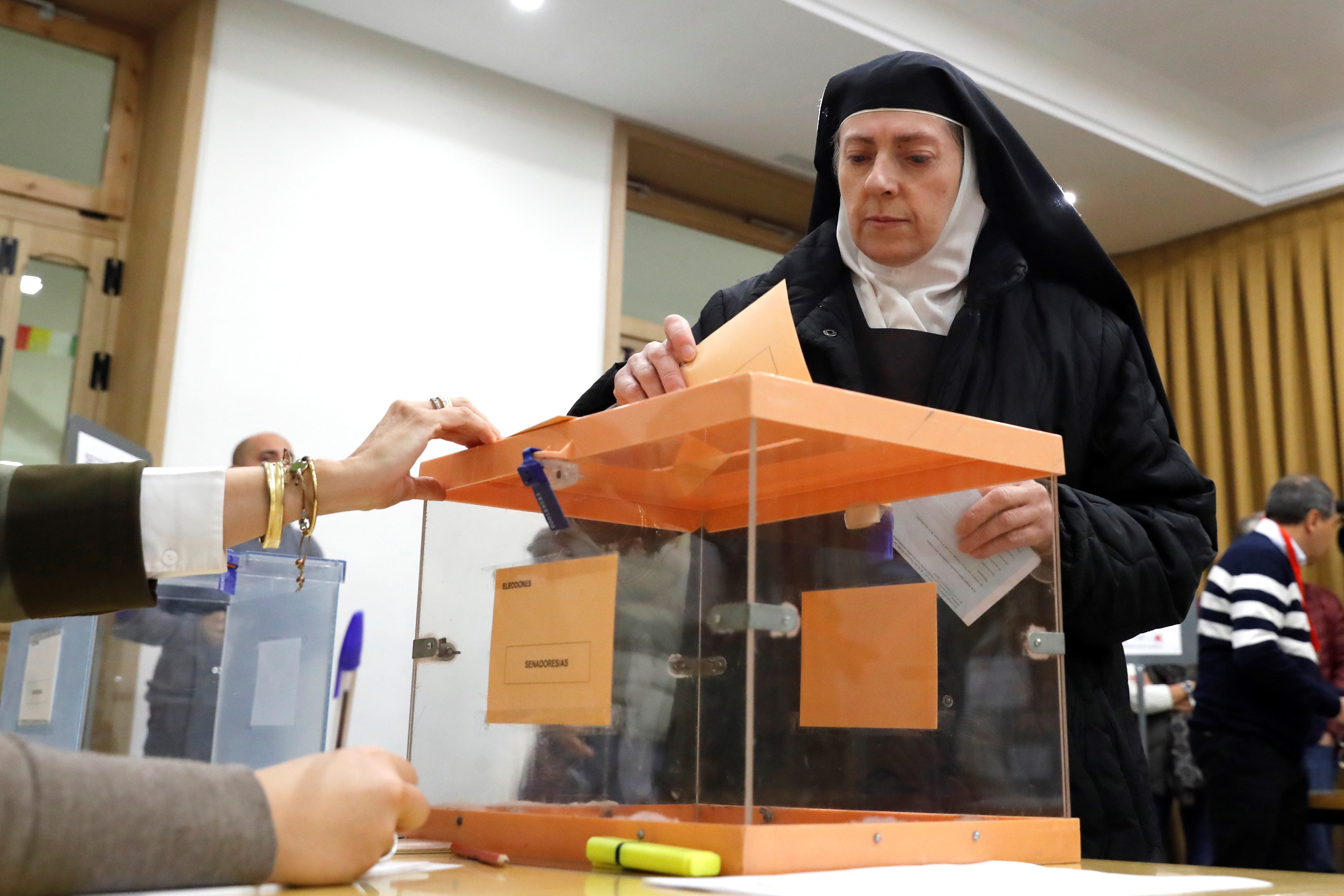epa07985346 A nun votes at a polling station in Madrid, Spain, 10 November 2019. Spain holds general elections after Spanish socialist Primer Minister Pedro Sanchez failed to form government following 28 April elections.  EPA/BALLESTEROS