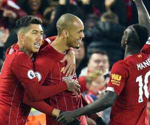 epa07986463 Fabinho (C) of Liverpool celebrates with teammates Roberto Firmino (L) and Sadio Mane (R) after scoring the 1-0 lead during the English Premier League soccer match between Liverpool FC and Manchester City in Liverpool, Britain, 10 November 2019.  EPA/PETER POWELL EDITORIAL USE ONLY. No use with unauthorized audio, video, data, fixture lists, club/league logos or 'live' services. Online in-match use limited to 120 images, no video emulation. No use in betting, games or single club/league/player publications
