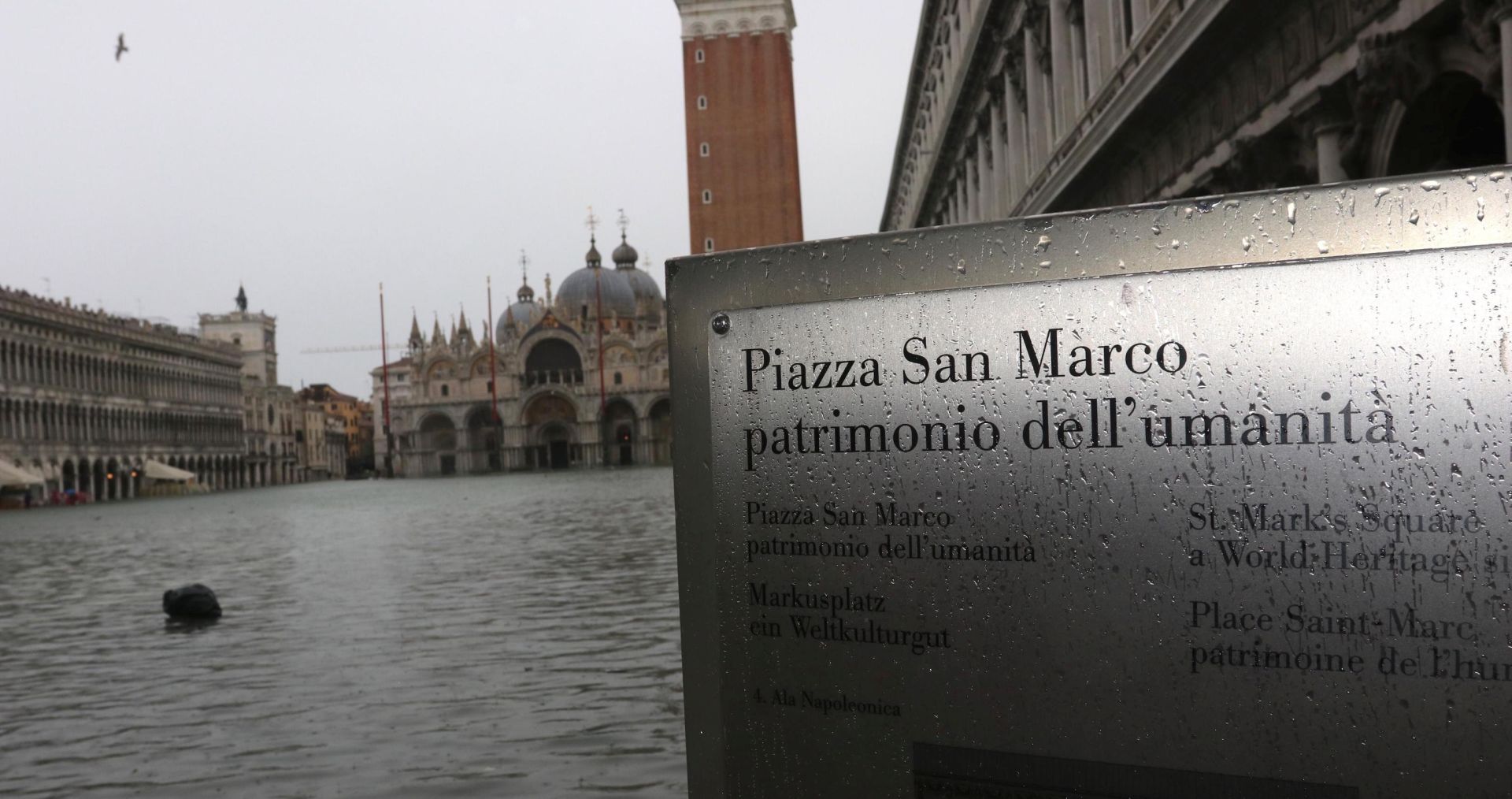 epa07999516 A view of flooded St Mark's Square during high water in Venice, northern Italy, 15 November 2019. Venice closed St Mark's Square due to fresh flooding in the city. The city is currently suffering its second-worst floods on record, with the high-water mark reaching 187cm on Tuesday. The water level had dropped down significantly but it is forecast to go back up to 160cm today.  EPA/EMILIANO CRESPI