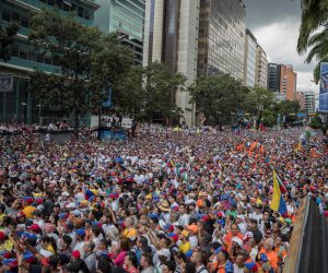 epa08002182 Opponents of the government of Nicolas Maduro march in Caracas, Venezuela, 16 November 2019. The opposition call was announced a month ago and during the last few weeks the political forces opposed to Chavism have been encouraging the population to participate in this demonstration. Guaido, recognized as president in charge of Venezuela by almost 60 countries, leads the movement and in recent hours has intensified his calls to the street after a student protest that was repressed with tear gas in Caracas.  EPA/Rayner Pena
