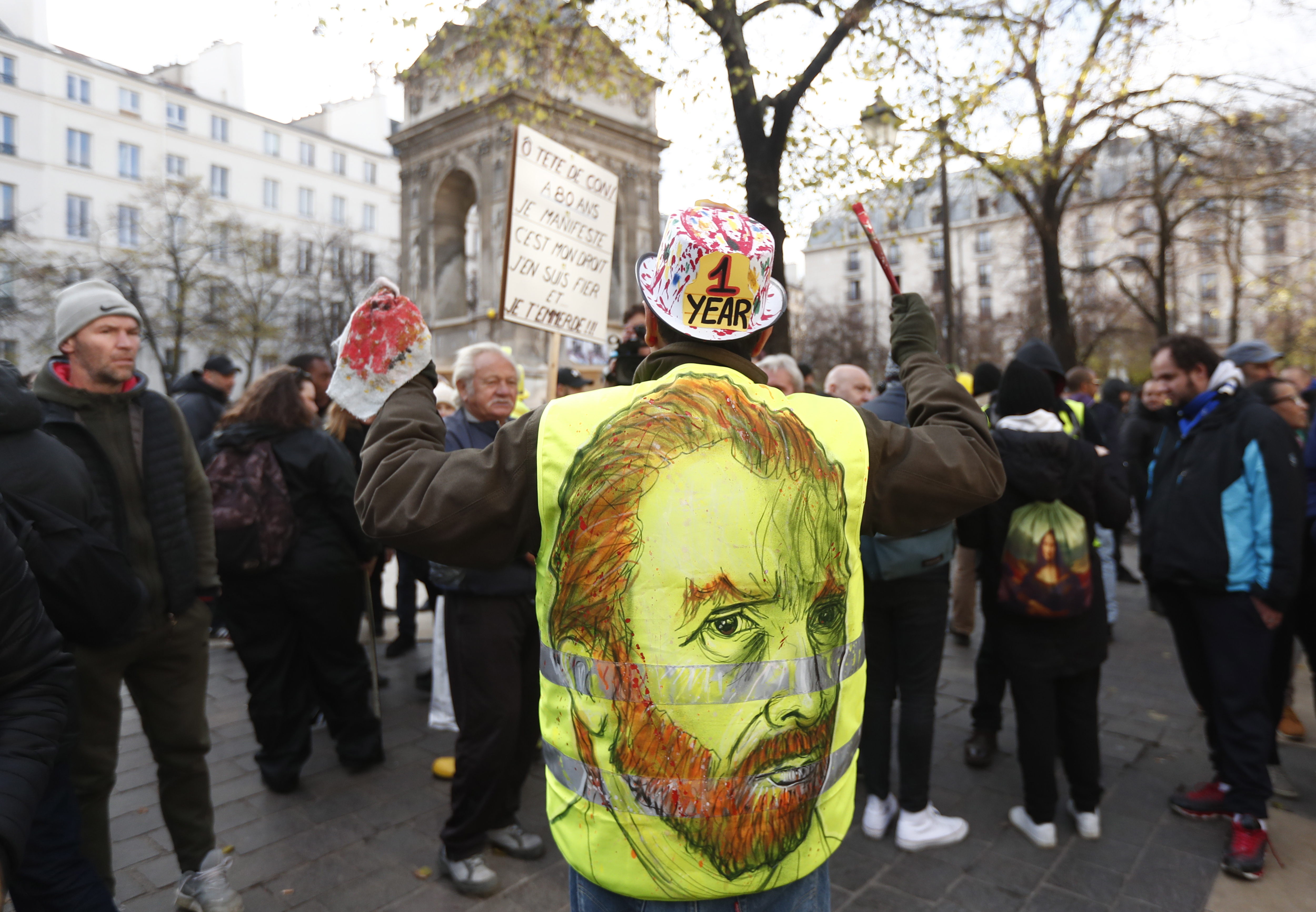 epa08003877 'Gilets Jaunes' (Yellow Vests) protesters gather in central Paris to mark the one year anniversary of the protest movement, in Paris, France, 17 November 2019.  November 17 marks one year to the day since the Yellow Vest movement started their weekly protest action in France.  EPA/IAN LANGSDON
