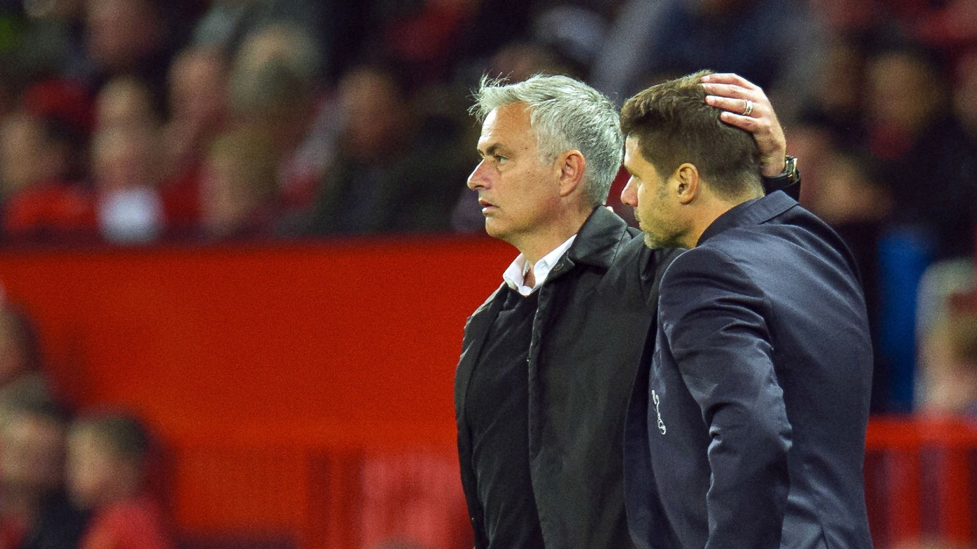 epa08010669 (FILE) - Manchester United manager Jose Mourinho (L) reacts with Tottenham Hotspur manager Mauricio Pochettino (R) after the English Premier League soccer match between Manchester United and Tottenham at the Old Trafford in Manchester, Britain, 27 August 2018 (reissued 20 November 2019). Tottenham Hotspur have announced the appointment of Jose Mourinho as their new manager.  EPA/PETER POWELL