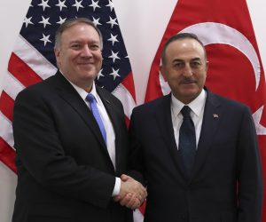 epa08011457 U.S. Secretary of State Mike Pompeo (L) shakes hands with Turkey's Foreign Minister Mevlut Cavusoglu during a NATO Foreign Ministers meeting at the NATO headquarters in Brussels, Belgium 20 November 2019.  EPA/Francisco Seco / POOL