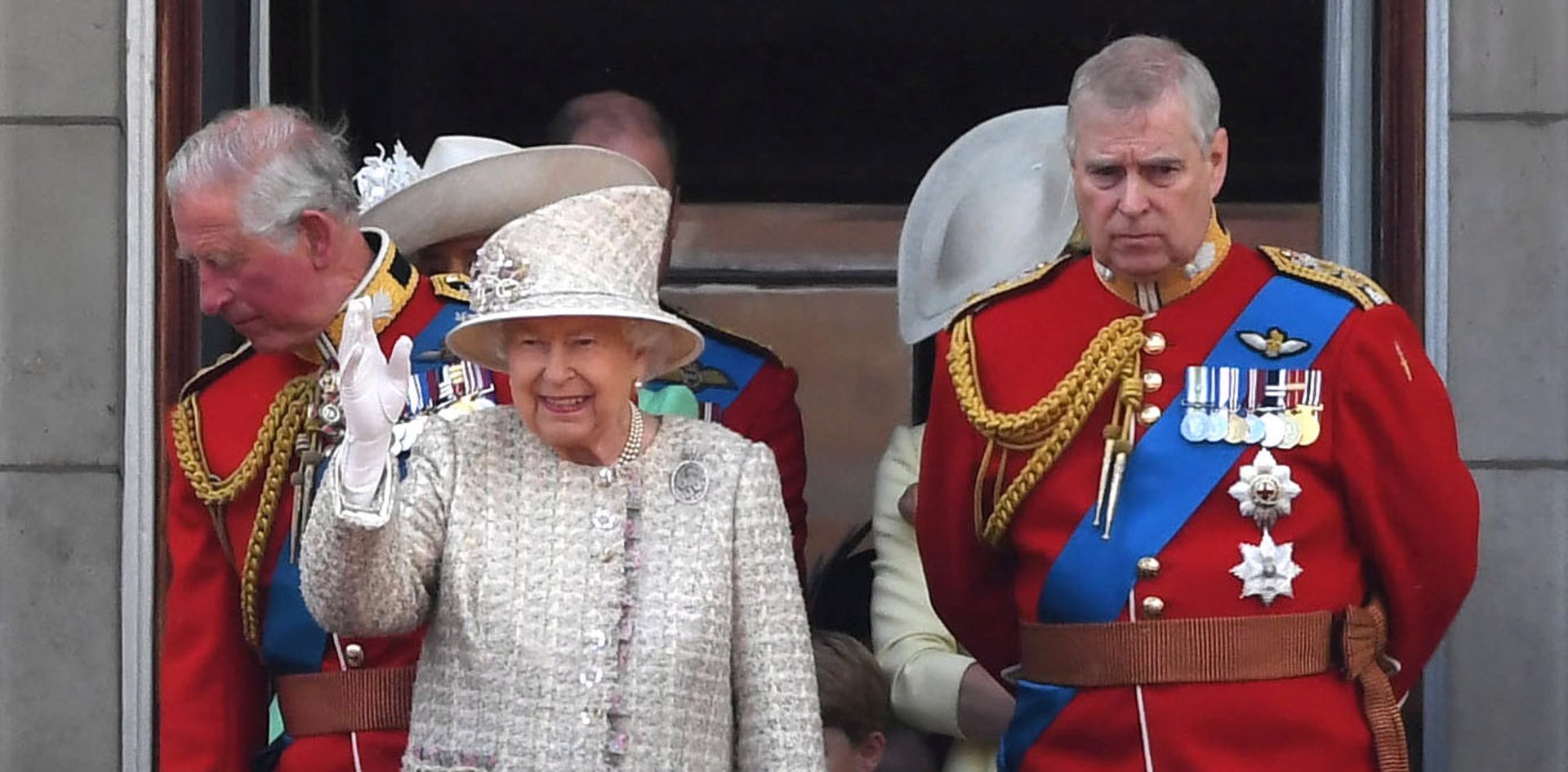 epa08012028 (FILE) - Britain's Queen Elizabeth II (L) and Prince Andrew (R) stand on the balcony of Buckingham Palace with other members of the Royal Family to watch a fly-past during the Trooping of the Colour Queen's birthday parade, in London, Britain, 08 June 2019 (reissued 20 November 2019). According to media reports on 20 November 2019, Prince Andrew, the Duke of York is stepping back from his royal duties for the 'foreseeable future' due to the Jeffrey Epstein scandal.  EPA/NEIL HALL