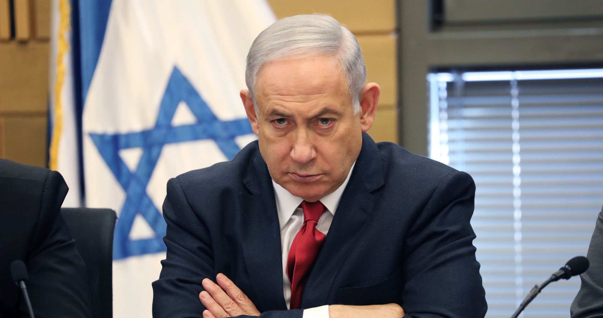 epa08014909 (FILE) - Israeli Prime Minister and leader of Likud Party Benjamin Netanyahu during an extended faction meeting of the right-wing bloc members at the Israeli Knesset (parliament) in Jerusalem, Israel, 18 November 2019 (reissued 21 November 2019). Reports on 21 November 2019 state Israeli Prime Minister Benjamin Netanyahu has officially been charged by the attorney general in a number of corruption scandals. Netanyahu was charged with bribery, breach of trust and fraud.  EPA/ABIR SULTAN