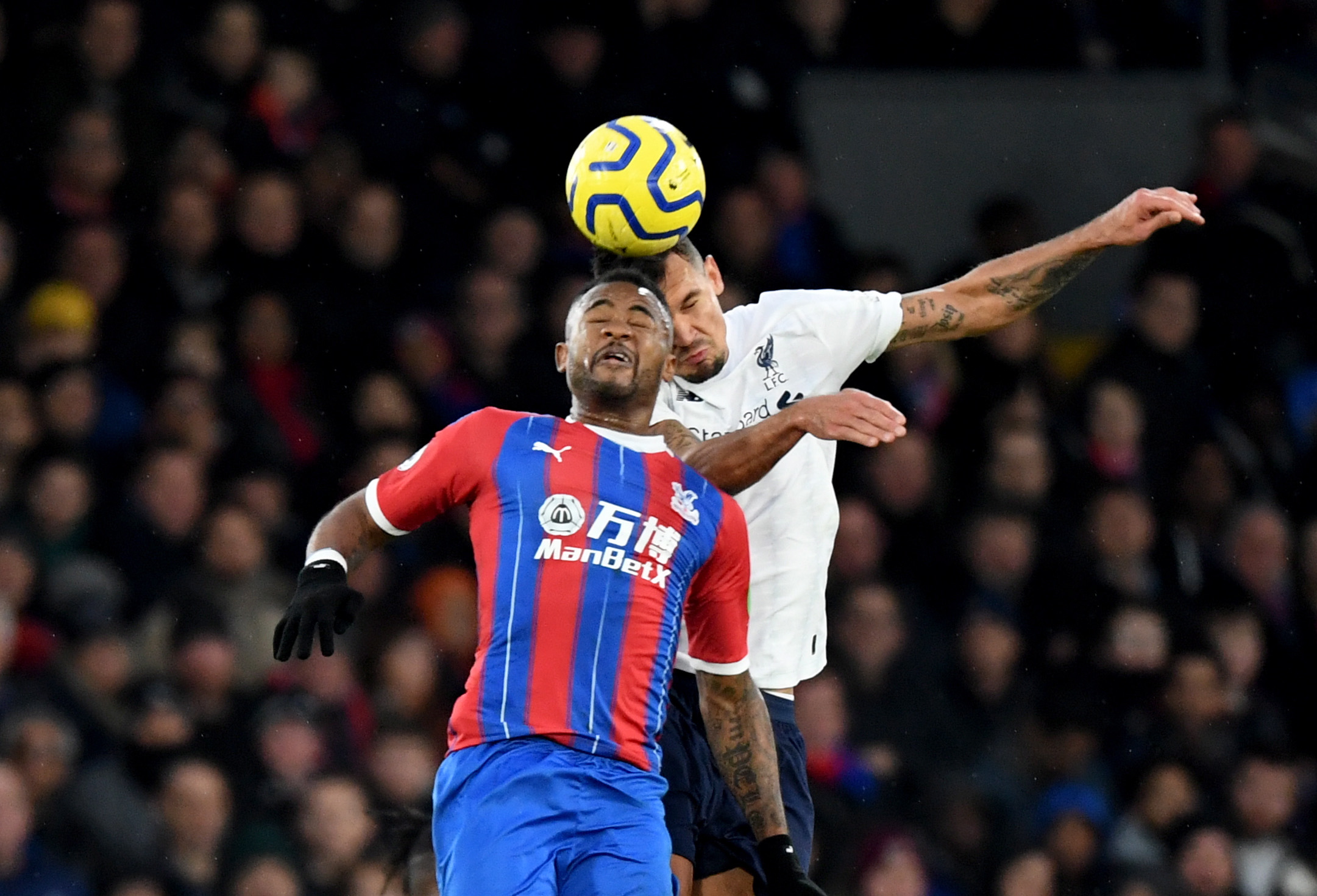 epa08019823 Liverpool's Dejan Lovren (R) in actions against Crystal Palace's Jordan Ayew (L)  the English Premier League soccer match between Crystal Palace v Liverpool at Selhurst Park in London, Britain, 23 November 2019.  EPA/FACUNDO ARRIZABALAGA EDITORIAL USE ONLY. No use with unauthorized audio, video, data, fixture lists, club/league logos or 'live' services. Online in-match use limited to 120 images, no video emulation. No use in betting, games or single club/league/player publications