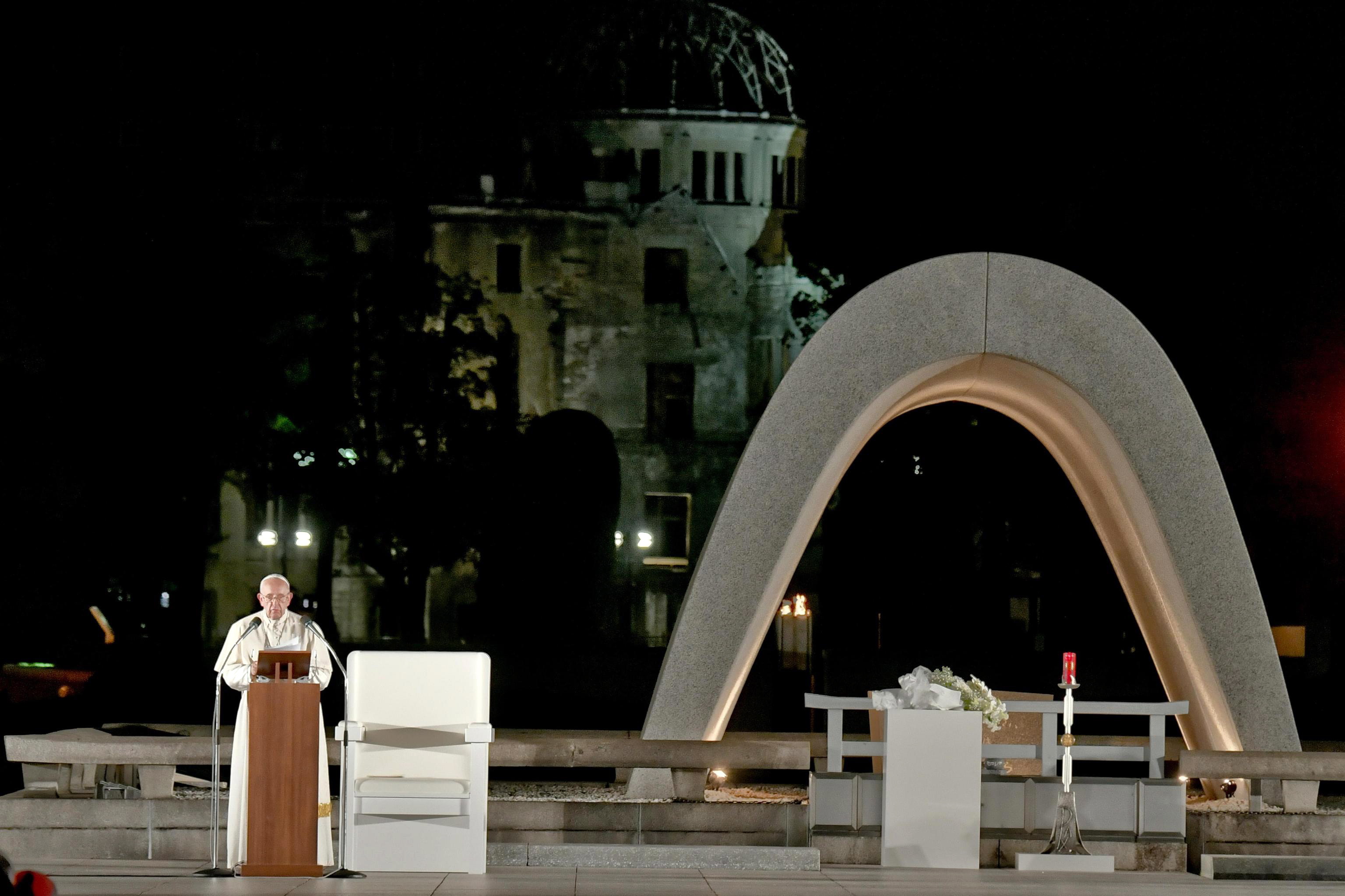 epa08021717 Pope Francis attends a meeting for peace sitting next to the Cenotaph for A-bomb Victims at the Hiroshima Peace Memorial Park in Hiroshima, Japan, 24 November 2019. The pope is on a four-day visit to Japan, the first in 38 years and only the second in history.  EPA/CIRO FUSCO