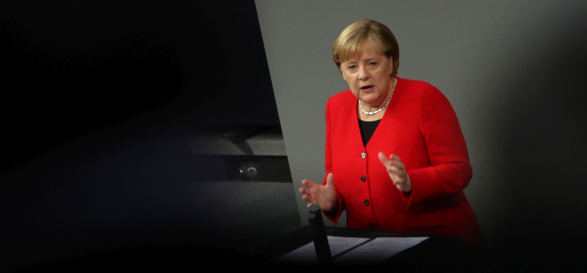 epa08028234 German Chancellor Angela Merkel speaks during a session of the 'Bundestag' German parliament in Berlin, Germany, 27 November 2019. Members of Bundestag will gather to debate on government policy.  EPA/HAYOUNG JEON